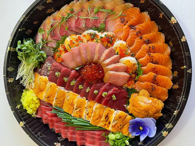 Colorful rainbow sashimi platter at Suki Station, a Japanese Restaurant in Brooklyn